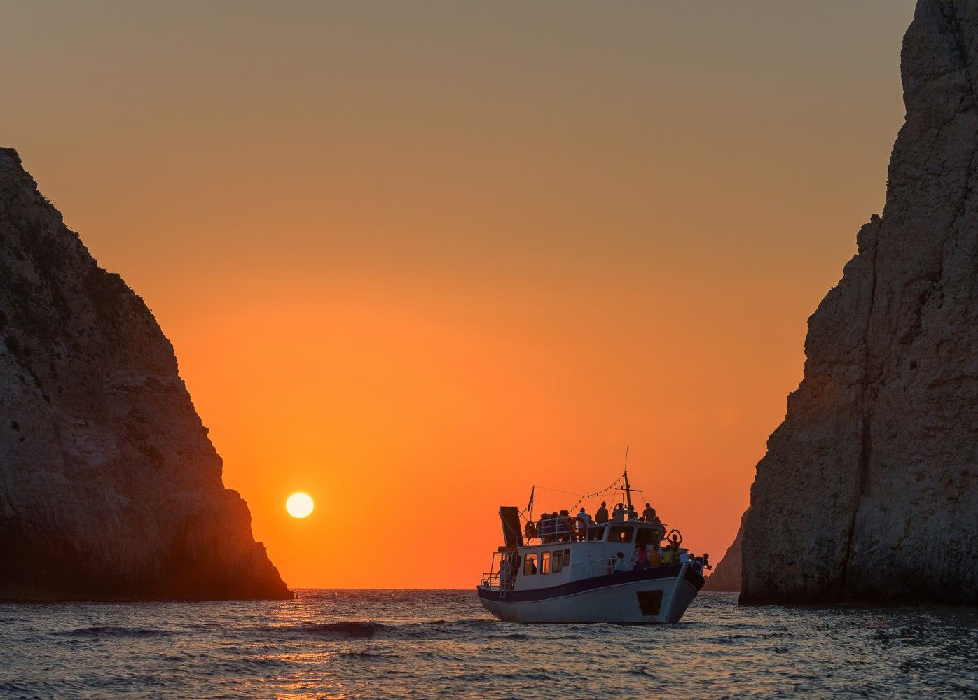 picture from activity Sunset Yacht Cruise to Shipwreck Beach & the Blue Caves