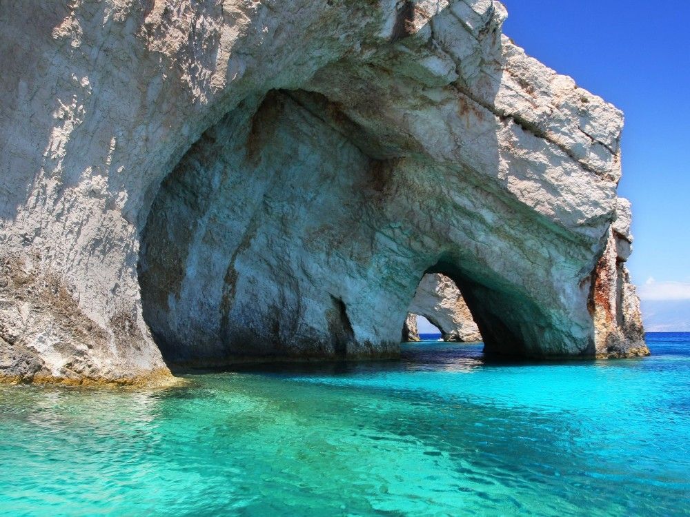 6-Hour Sailing Yacht Cruise to Shipwreck Beach & the Blue Caves